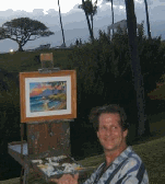 artist creating one-of-a-kind sunset painting