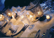 wedding table of simple votives and candles